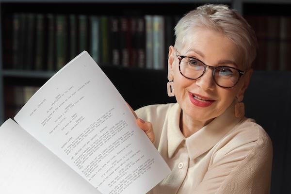 Woman presenting her manuscript