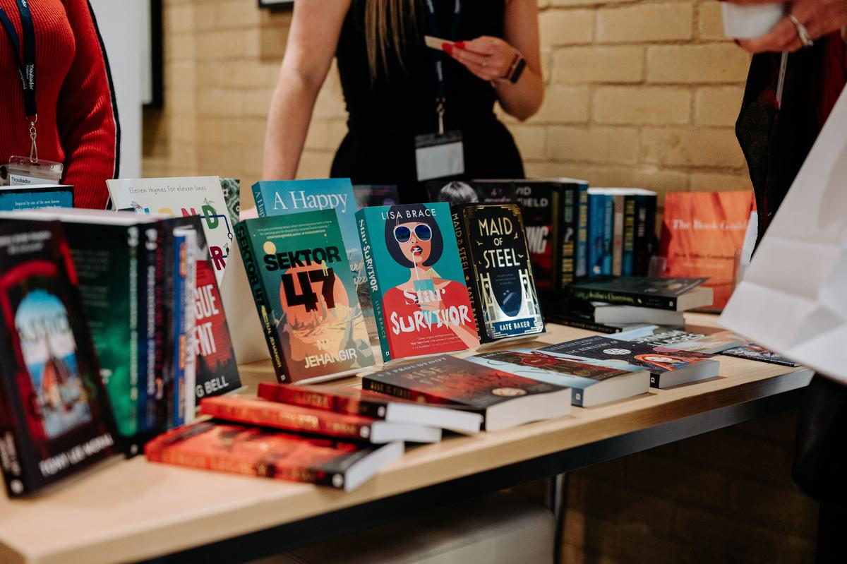 Birds eye view of someone holding an open book